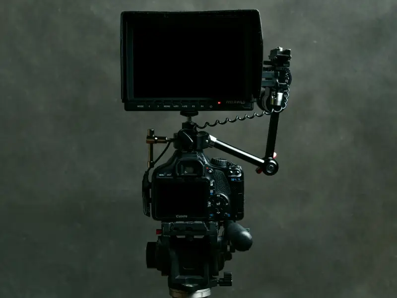 Camera on tripod with a monitor